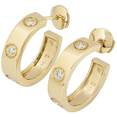 gold earrings cartier|cartier style gold hoop earrings.